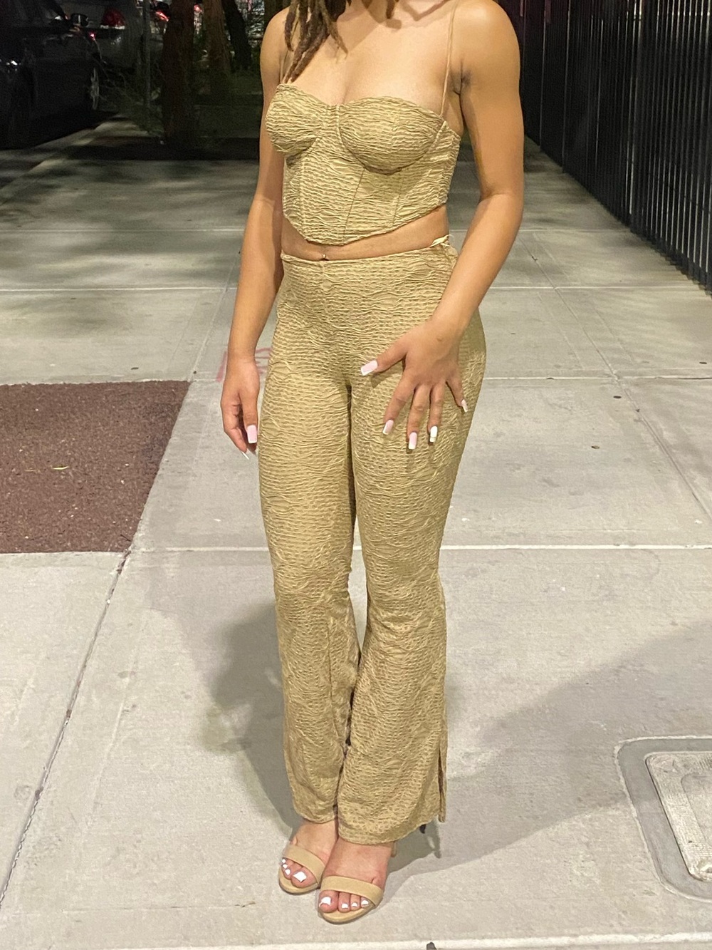 Fashion Nova gold jumpsuit with corset top and flared pants
